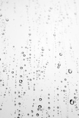 Drops of rain on the inclined window