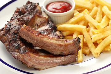 barbecued pork spare ribs and french fries