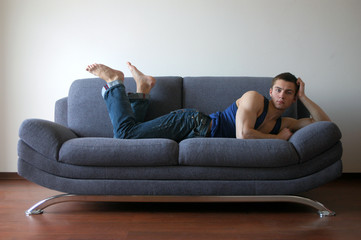 Sexy Man Lying on the Sofa