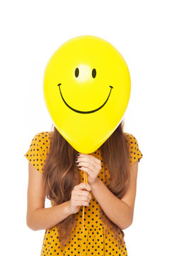 Woman With Smiley Face Balloon