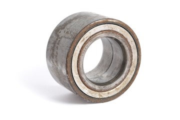 1 used unuseful and dirty bearing on a white background