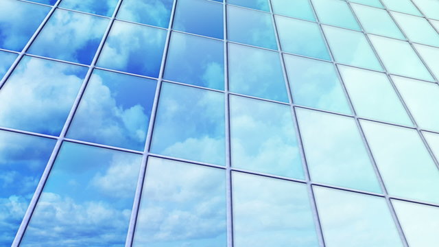 clouds reflected in windows of skyscraper loop