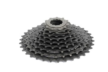 New nine speed rear bicycle sprocket on a white background
