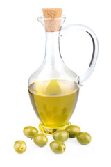 bottle of olive oil with berries isolated