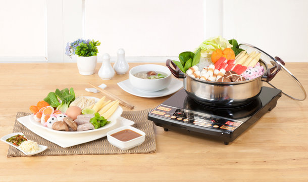 Electric appliance aluminum sukiyaki pot in the kitchen