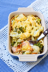 Salmon, broccoli and cauliflower pasta bake with cheese