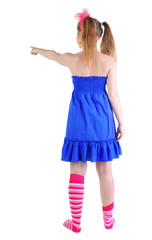 back view of standing beautiful red haired  teenager pointing