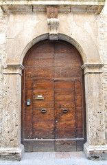 Wooden door. San Gemini. Umbria. Italy.