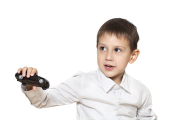 Child playing with toy car