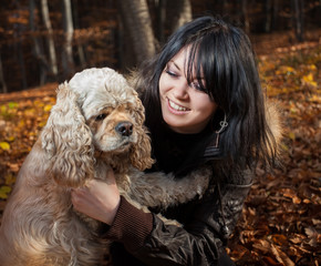 Girl and american cocker spaniel