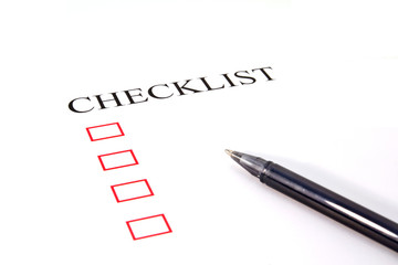 Checklist with pen and checked boxes.