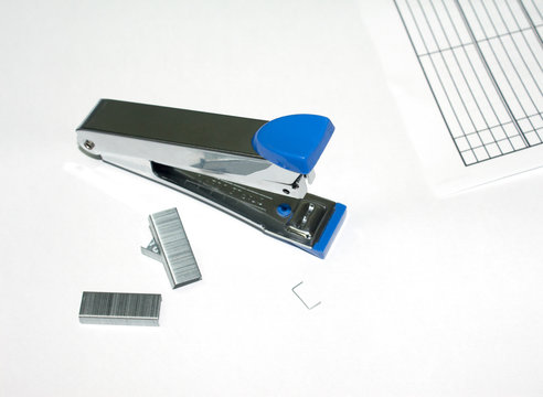 Blue max stapler on white background
