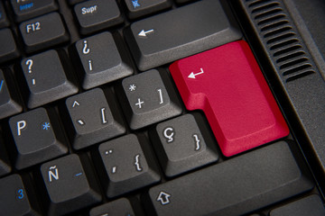 Black keyboard with red key