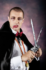 Portrait of a man with Count Dracula style make-up. Shot in a st