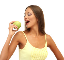 beautiful young woman with green apple, isolated on white