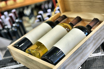 Red and white wine in bottles