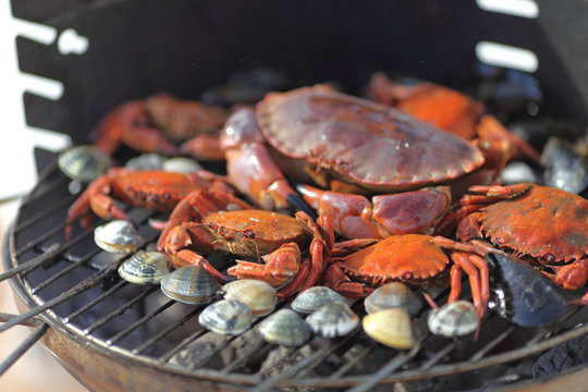 crabs shrimps on charcoal grill