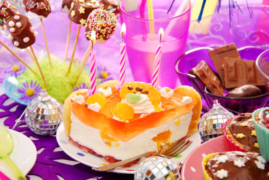 decoration of birthday party table with sweets for child