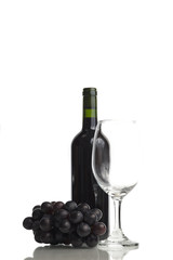 Red wine, glass and grape isolated on white background