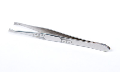 Pair of steel tweezers, isolated on white background