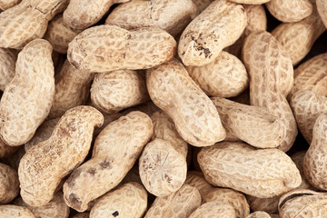 Background made of roasted peanuts in a pile