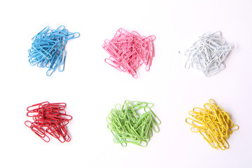 Color paper clips isolated on white background