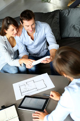 Couple meeting consultant for financial contract