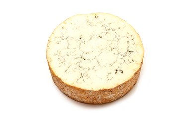 Stilton cheese isolated on a white studio background.