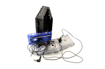 80's walkman, headphones and cassette tapes