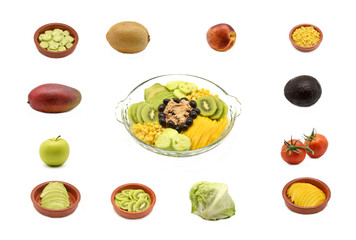 Tropical salad surrounded by its main ingredients