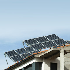 Fototapeta premium Solar panels on the roof of a building