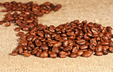 Coffee beans lying on sacking