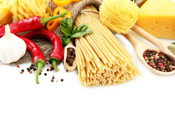 Pasta spaghetti, vegetables and spices, isolated on white