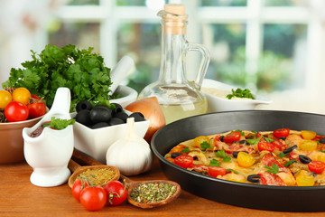 colorful composition of delicious pizza, vegetables and spices