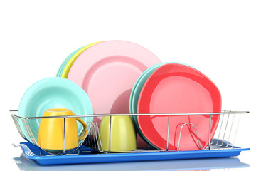 Color plates in rack isolated on white