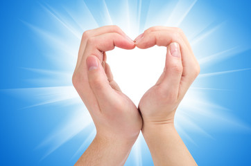 Two hands form a heart shape