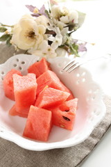 Water melon cut on dish for summer dessert imag