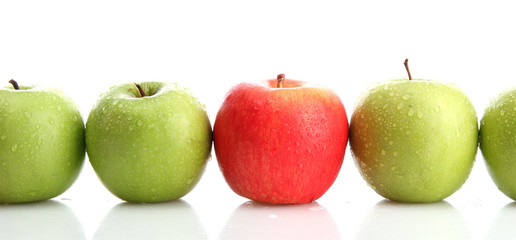 Ripe green apples and one red apple isolated on white