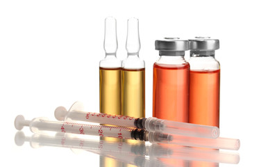 medical ampules and syringes, isolated on white