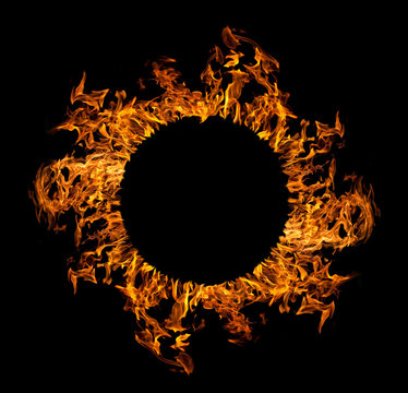 circle of orange flame isolated on black