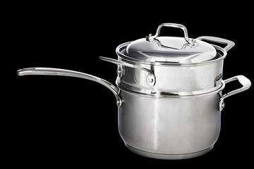 Steam shiny metal saucepan complex isolated in black