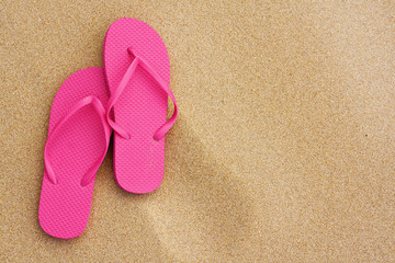 Fototapeta na wymiar Summer vacation background sandals on beach
