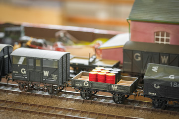 model railway freight train transporting oil drums