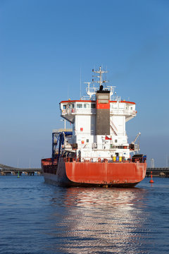 A cargo ship leaving the port of Gdansk, Poland.