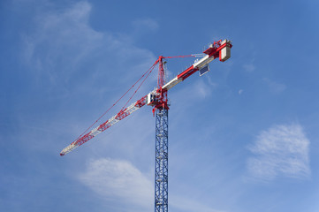 Construction crane against blue sky