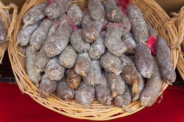 Saucisson or salami on a French market stall