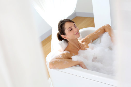 Beautiful Woman Relaxing In Bathtub