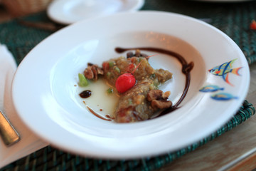 Eggplant dip appetizer with tomato