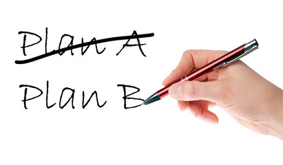 Hand with pen writing Plan A and Plan B