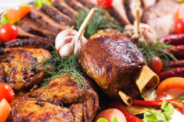 barbecue with sauce and vegetables